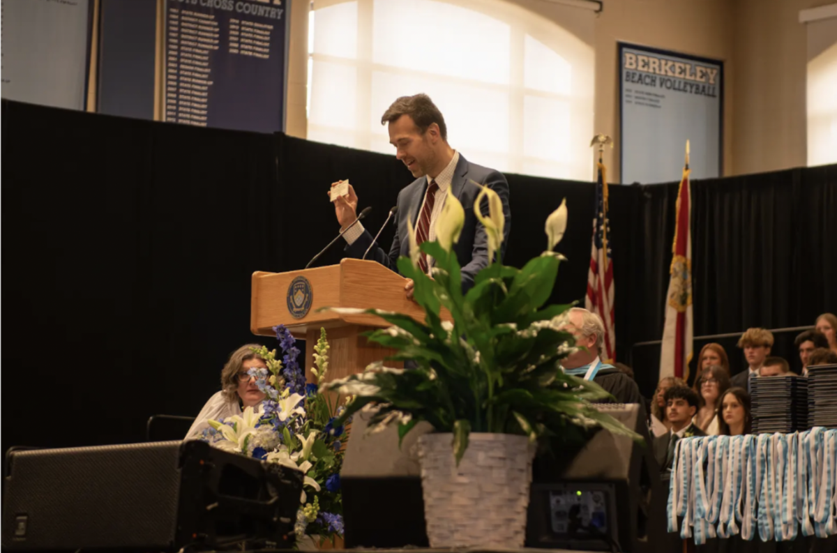 POCKET-SIZED SUCCESS: Errico shares the power of his tiny, wallet-sized diploma.